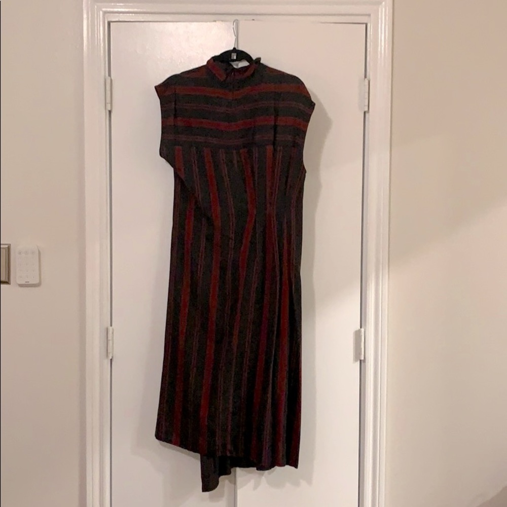 Asymmetrical Asian inspired dress. Complementary